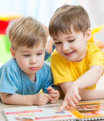 Little Boys Looking at Book in Lewisville, TX